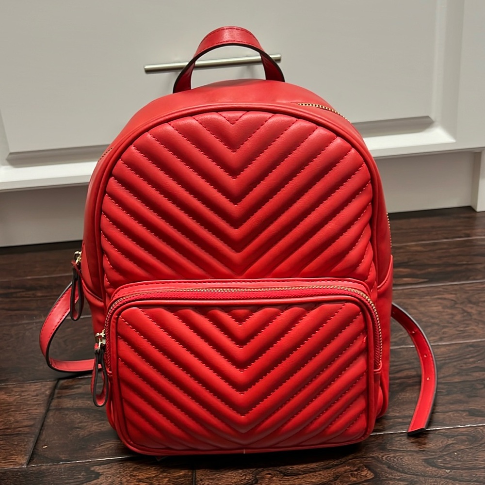 BCBG red faux leather quilted backpack